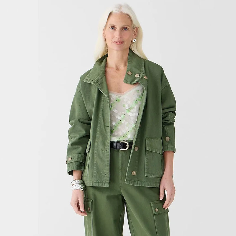J.Crew model wearing green jacket with matching pants and sequin top