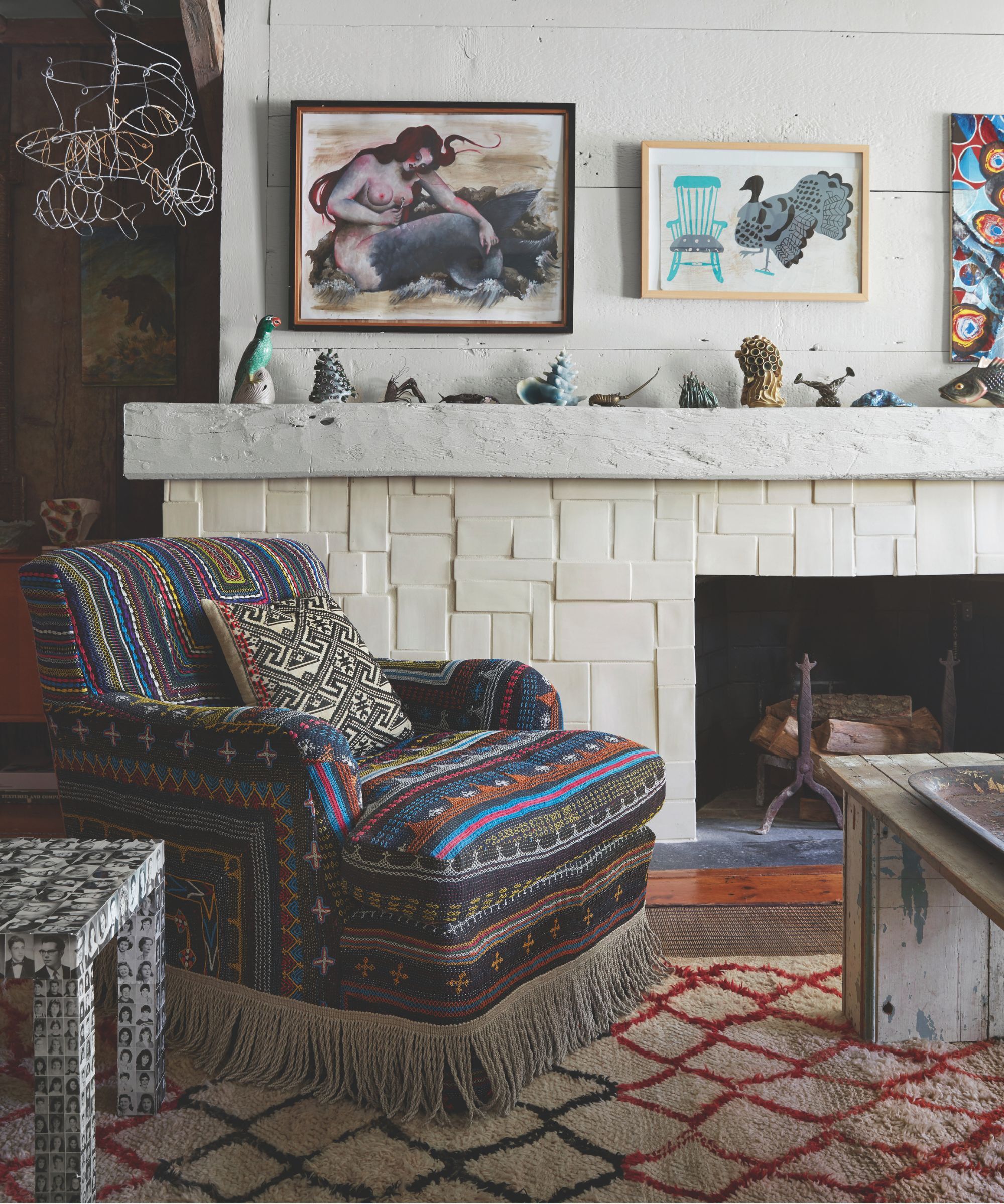 A rustic sitting room with a striped armchair
