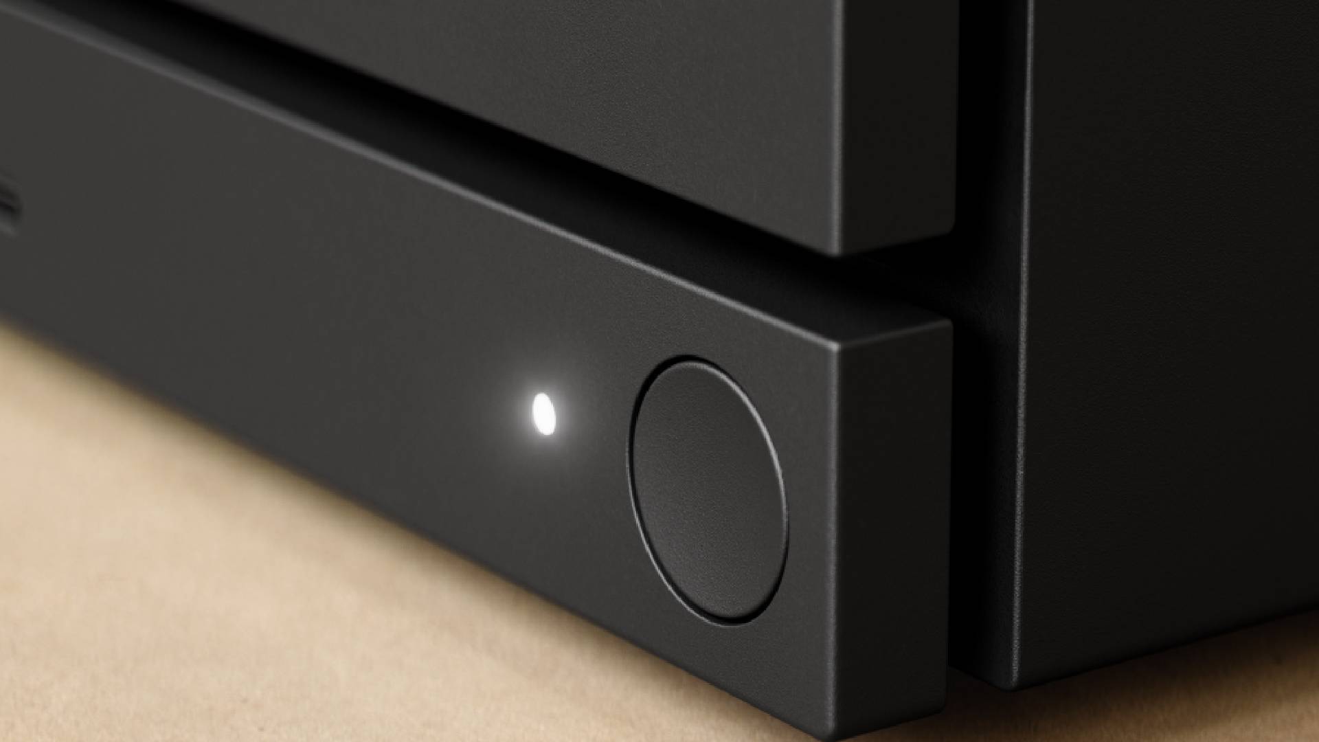 Close up of Steam Machine button.