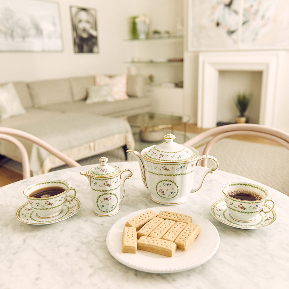 dining table with tea pot and cups