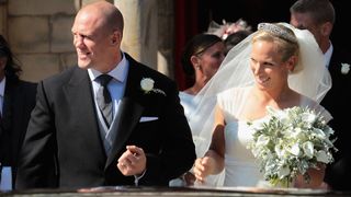 Zara Phillips and Mike Tindall attend their wedding at Canongate Kirk