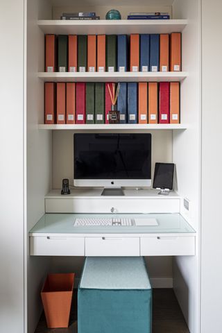 A bedroom office that can be closed away with full height doors