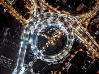 Can you fly a drone at night? image shows photo of highway at night taken with a drone