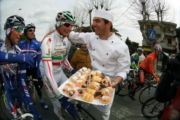 Katusha boys scramble for some baked goods