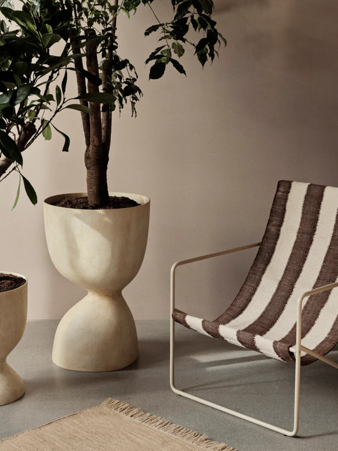 A textured tall planter from Ferm Living