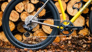 A yellow gravel bike equipped with a Vistar - Powershift groupset 