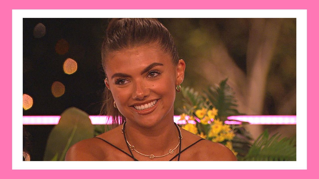 Love Island&#039;s Samie wearing a gold choker necklace, with her hair in a ponytail on winter Love Island 2023/ in a pink template