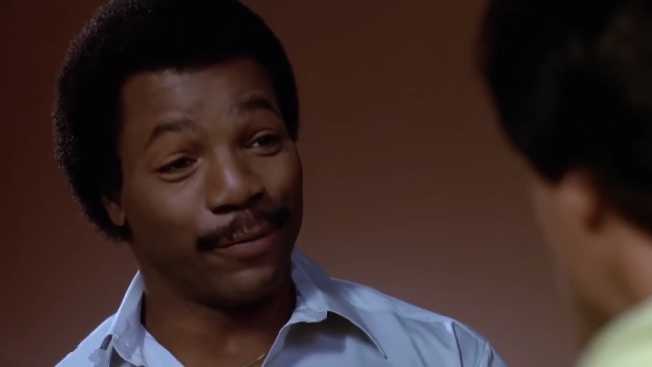 Apollo Creed (Carl Weathers) talking with Rocky Balboa in Rocky III