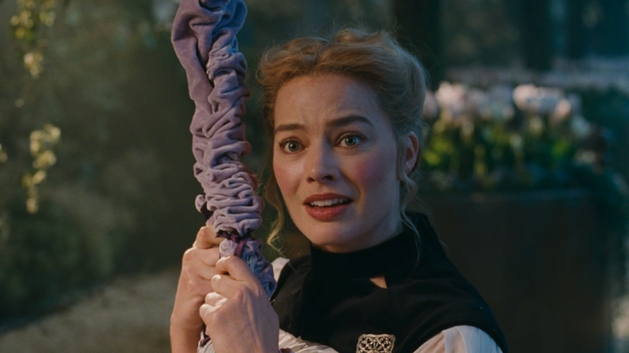 Margot Robbie on a swing in Wuthering Heights