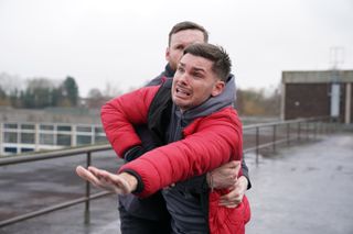 Ste is trying to rescue his husband James Nightingale but is grabbed by Murphy.