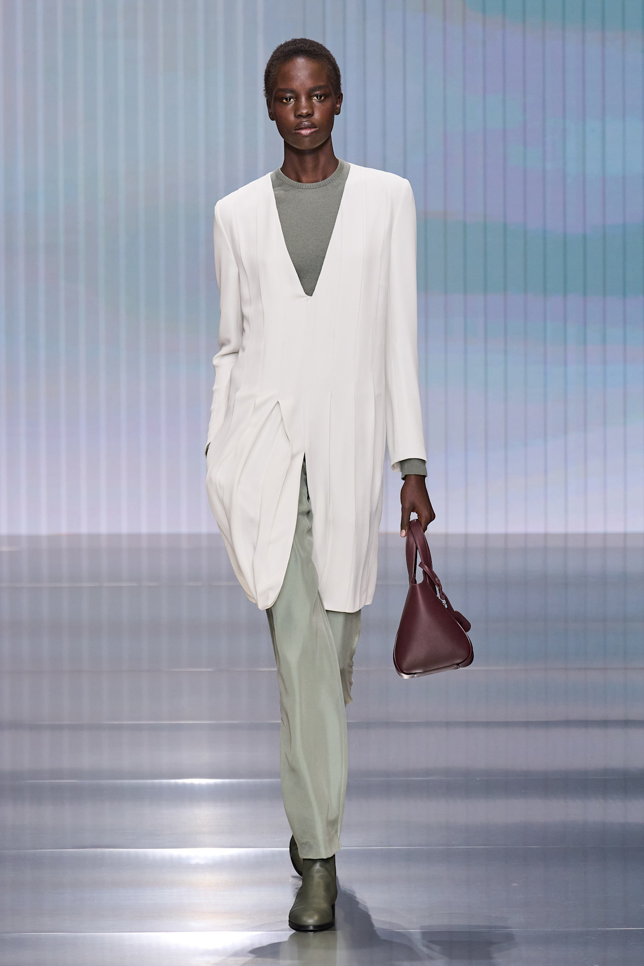 a model walks the giorgio armani fall/winter 2026 show.