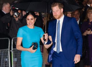 Prince Harry and Meghan Markle arriving at one of their last engagements as working royals in 2020