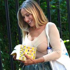 Sarah Jessica Parker on set of And Just Like That with Sally Rooney's new book