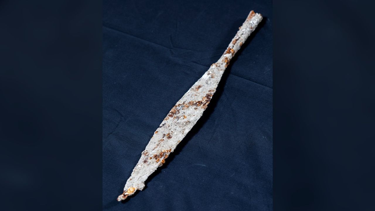 This is a large, rotted iron spearhead found at an Anglo-Saxon grave.