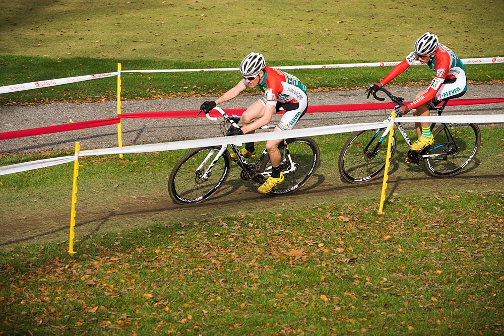 A couple of BJCT (7-Eleven) riders makes their way along the course, junior men