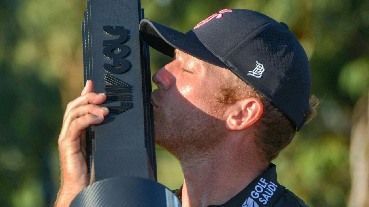 Talor Gooch with the LIV Golf Adelaide trophy