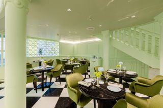 green interior of Prada Caffè at Harrods in London