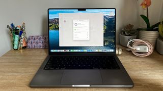 WhatsApp on MacBook Pro on a desk