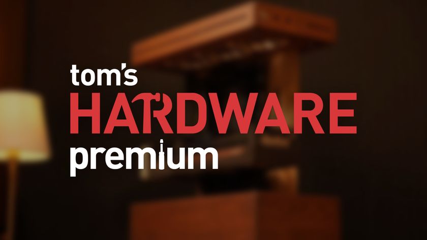 Tom&#039;s Hardware Premium Logo on a blurred background featuring a wooden PC