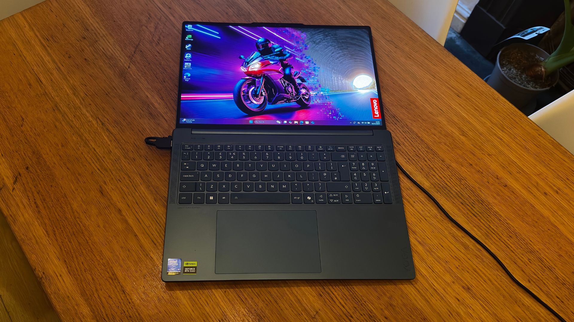 Lenovo Yoga Pro 9i Gen 10 Aura Edition with hinges at 180&amp;ordm;