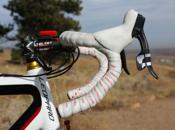 Parbo's SRAM Force levers are set high on Selcof anatomic-bend handlebars.