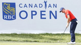 Rory McIlroy of Northern Ireland putts on the 14th green during the final round of the RBC Canadian Open