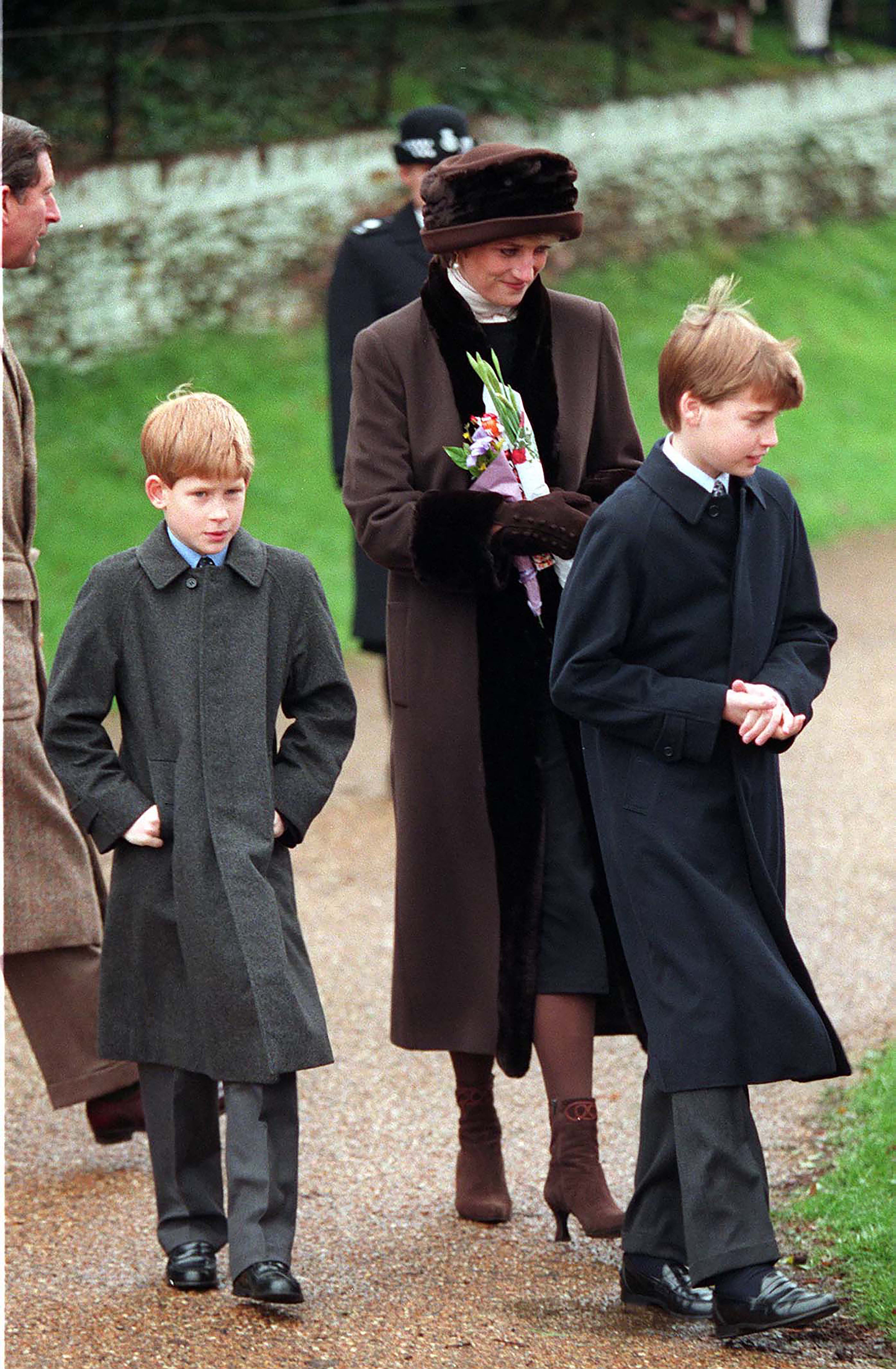 Princess Diana walking with Prince Harry and Prince William on Christmas 1994
