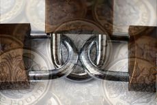 The UK state pension triple lock symbolised by three interlinked padlocks and UK coins