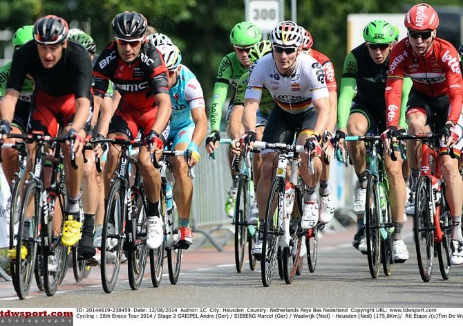 Andr&eacute; Greipel (Lotto Belisol) sits in the peloton behind the BMC riders