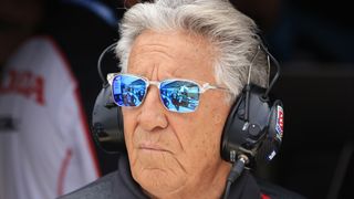 Former Indy 500 Champion Mario Andretti looks on during practice for the 107th Indianapolis 500 at Indianapolis Motor Speedway