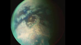 A sphere of blue and white is on top of a black background