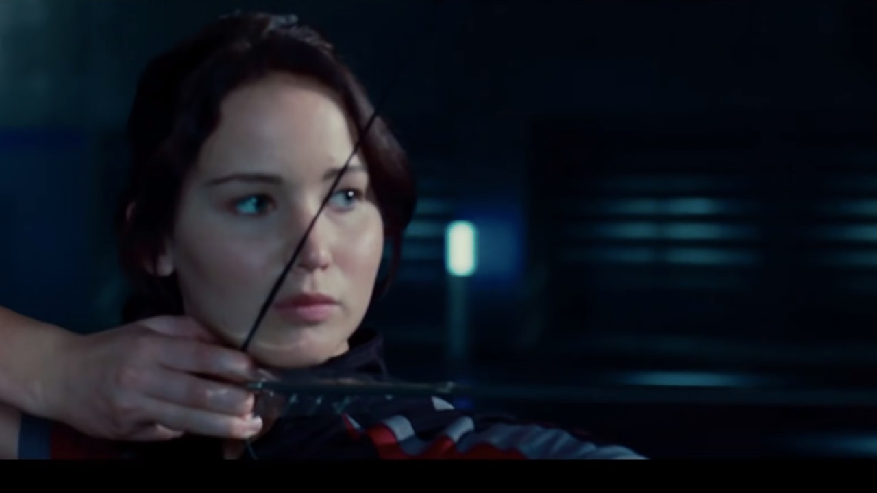 Katniss Everdeen shooting an arrow
