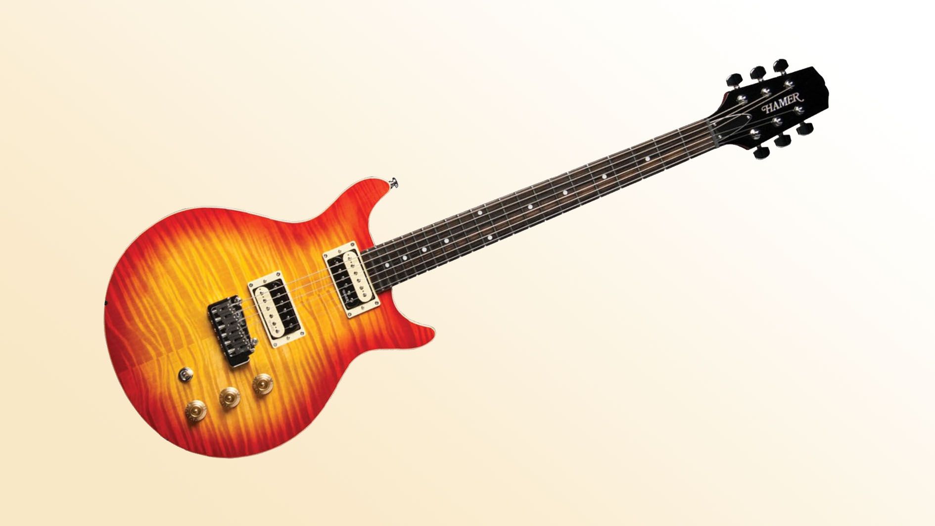 Save a massive 40% on this dazzling Hamer Sunburst double-cut
