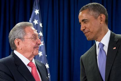Obama meets with Raul Castro.