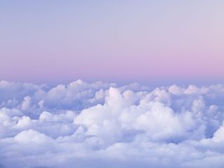 first light on cumulus clouds