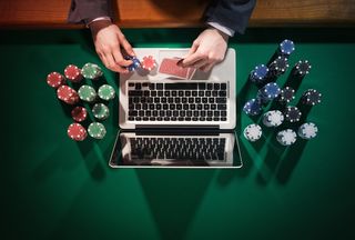 computer and poker chips