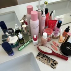 Beauty products on top of a bathroom counter
