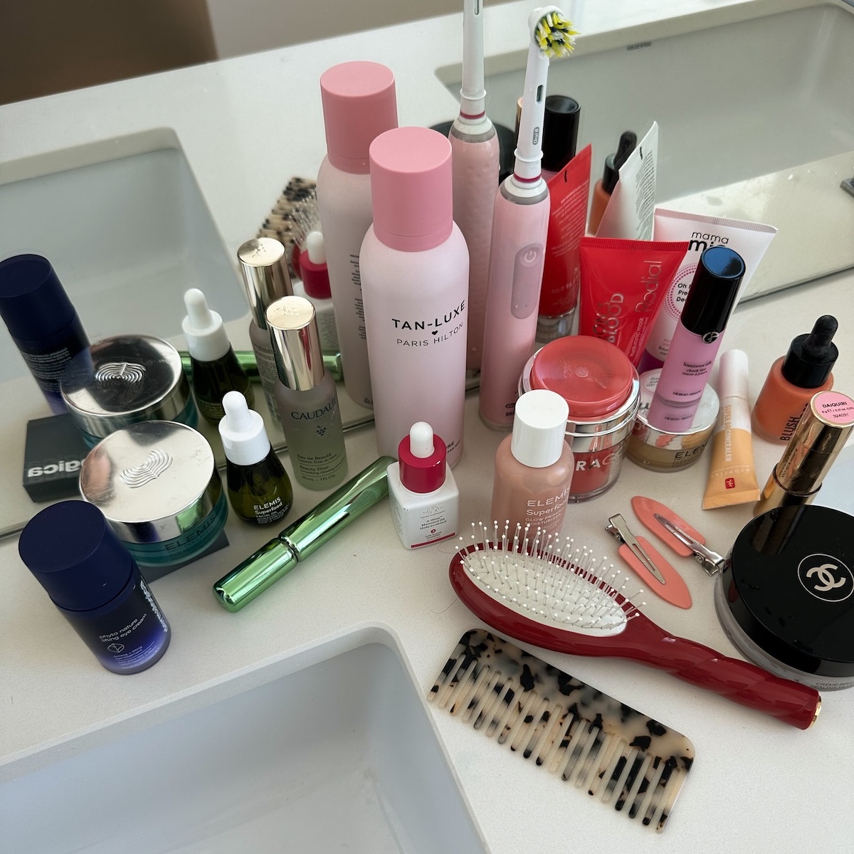 Beauty products on top of a bathroom counter