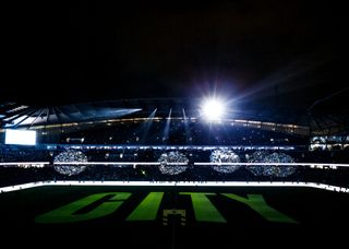 A general view inside the stadium as the word 'City' is projected on the pitch during a lights soprior to the Premier League match between Manchester City and Leeds United at Etihad Stadium on December 14, 2021 in Manchester, England.
