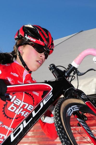 Sarah Huang (Planet Bike) leading the 15-16 race climbing the steps.