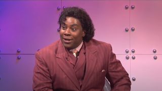 Kenan Thompson sitting during What's Up With That sketch