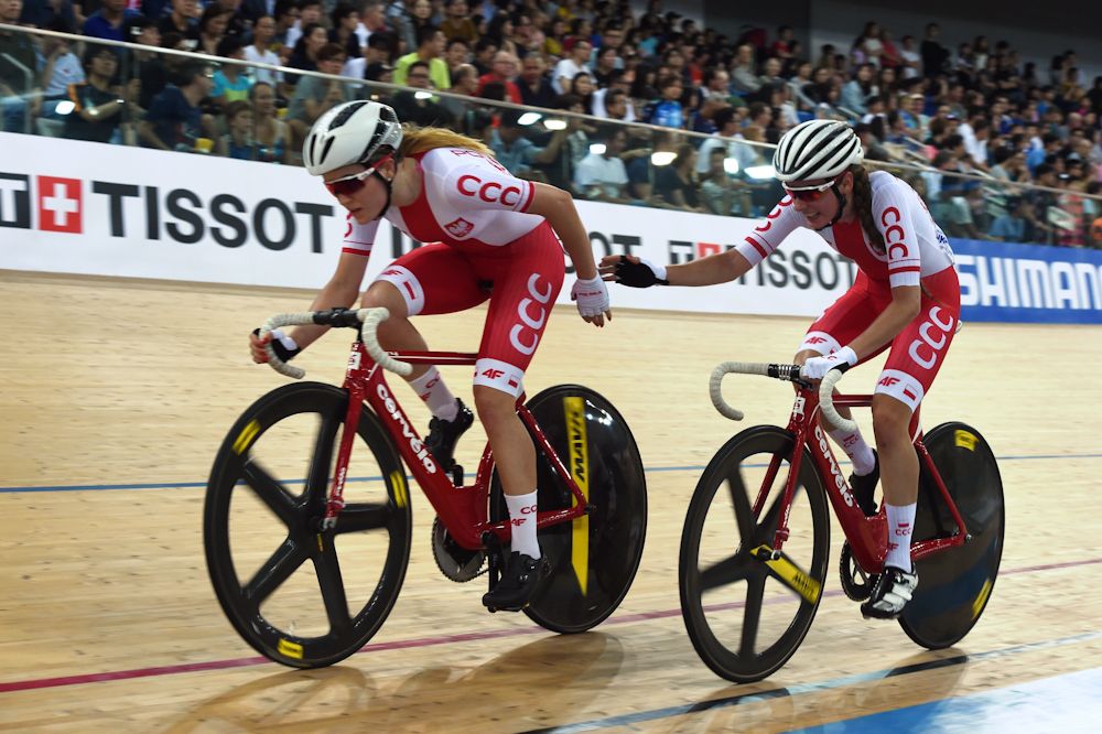 Poland's Daria Pikulik and Nikol Plosaj compete during the women's madison final at the Hong Kong Velodrome during the Track Cycling World Championships