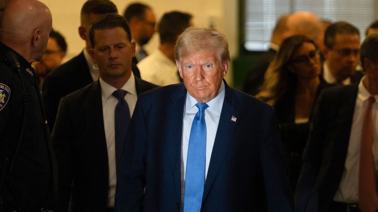 Donald Trump leaves the New York Supreme Court during his civil fraud trial testimony