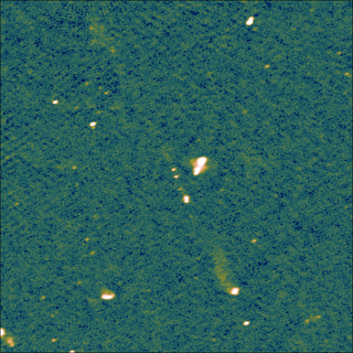 Porphyrion as seen by the LOFAR radio telescope emerging from a black hole 7.5 billion light-years away