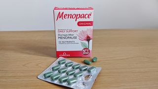 Blister pack of capsules next to the Vitabiotics Menopace box