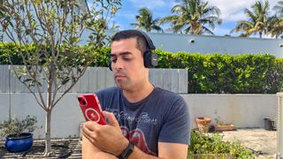 Marshall Major V headphones worn by reviewer Alex Bracetti testing call quality