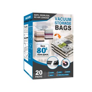 A blue, black, and white box with vacuum storage bags on the front ofit and text that says 'vacuum storage bags'