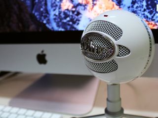 Microphone next to Mac monitor