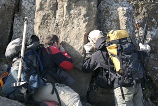 Geologists from the University of British Columbia examine pyroclastic deposits on the south side of the Kima'Kho volcano.