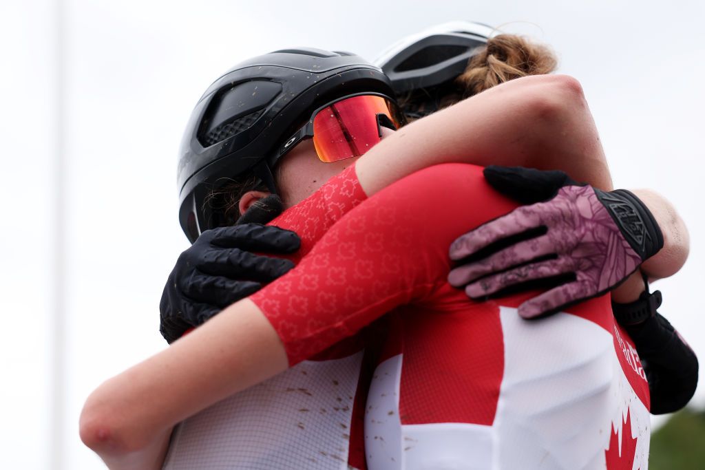 GLENTRESS FOREST PEEBLES SCOTLAND AUGUST 10 LR Second ranked Marin Lowe of Canada and race winner Isabella Holmgren of Canada react after the Women Junior Crosscountry Olympic at the 96th UCI Cycling World Championships Glasgow 2023 Day 8 UCIWT on August 10 2023 in Glentress Forest Peebles Scotland Photo by Dean MouhtaropoulosGetty Images